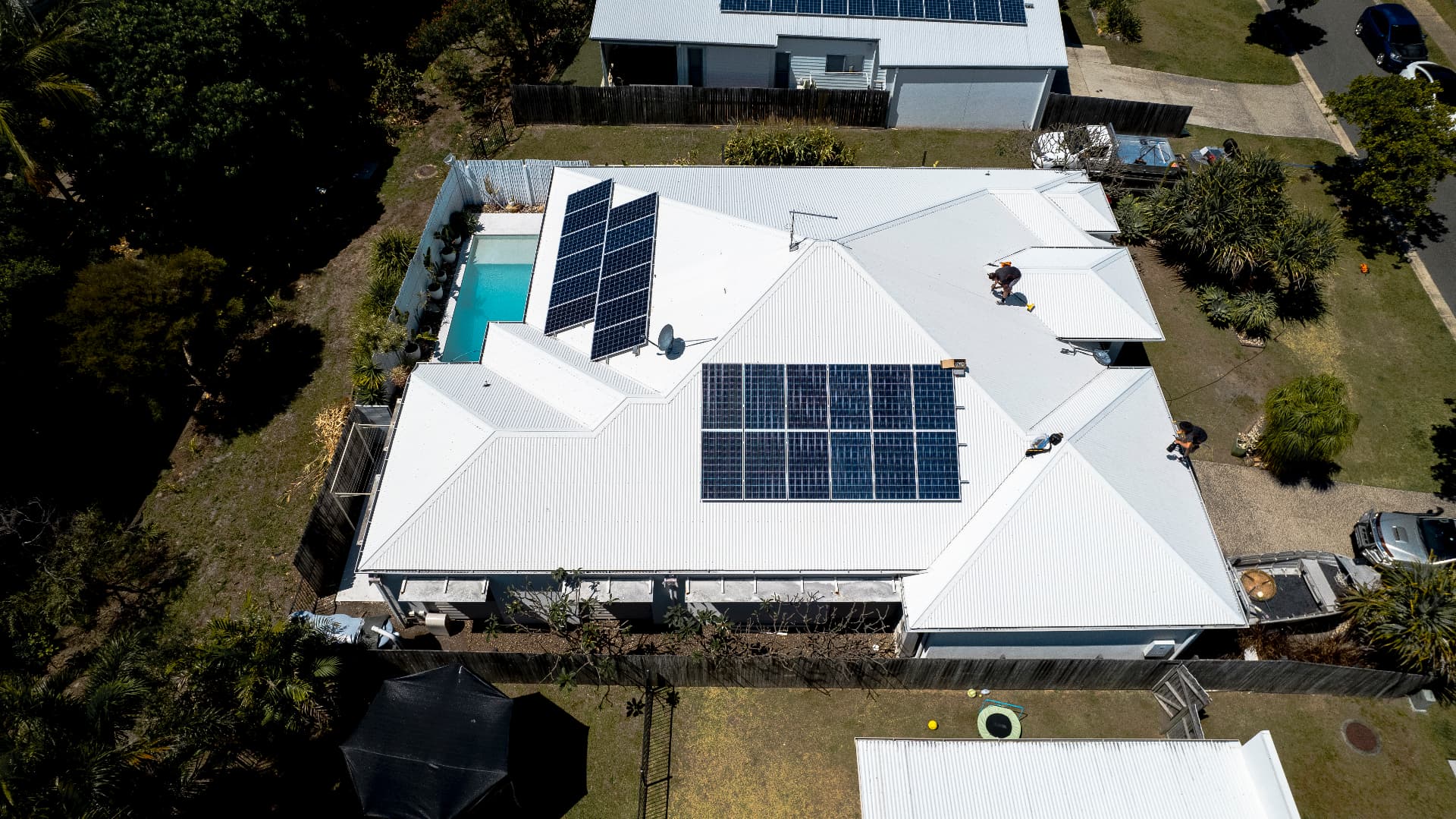 Aerial view of roof and solar panel cleaning on the Sunshine Coast